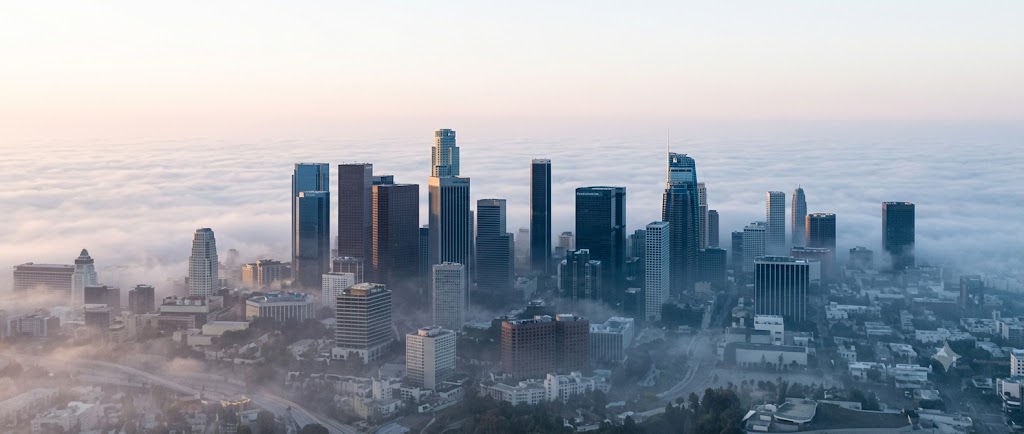 Downtown towers rising out of low morning fog