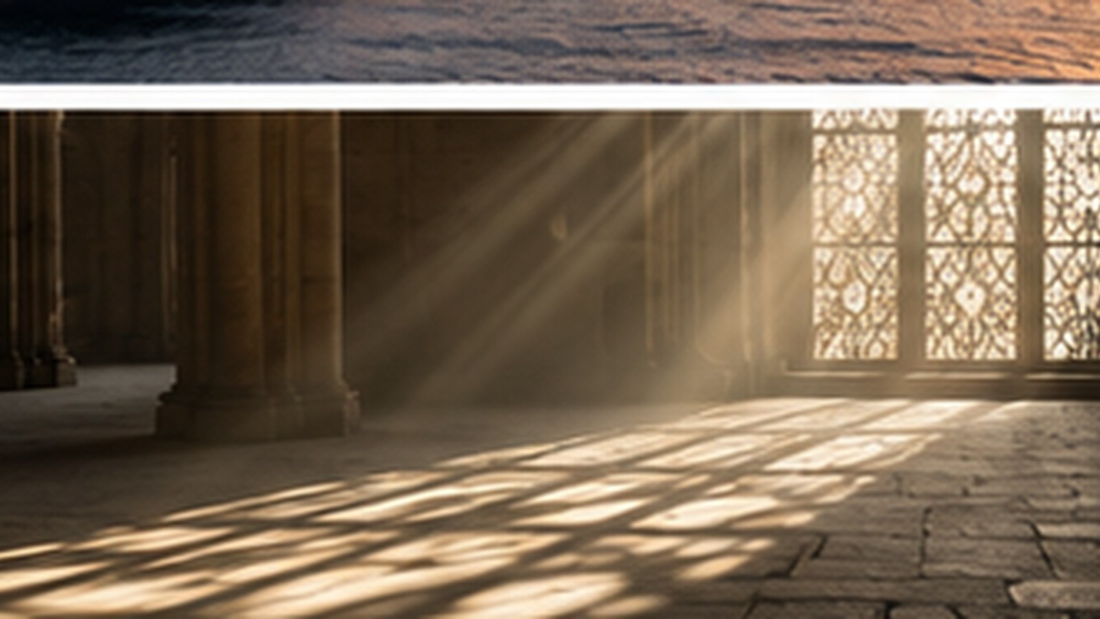 A sunlit stone hall with tall latticed windows throwing patterned light across a flagstone floor.